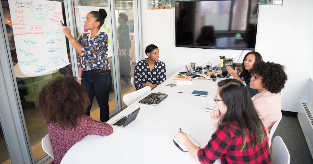 Women Colleagues gathered inside Conference Room